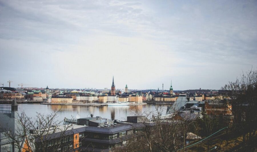 Stockholm: Christmas Markets & Lights Guided Walking Tour - Old Town Christmas market lights, trees, and the market story